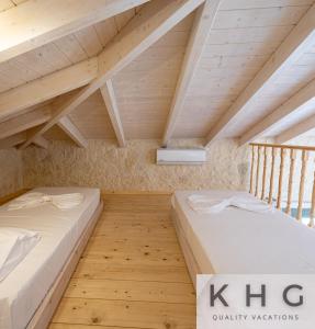 Leos Red stone & White stone made villas, 2 villas with private pool in Karavados village