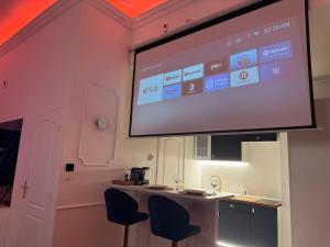 Appartements Evasio Suite : photos des chambres