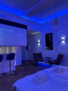Appartements Evasio Suite : photos des chambres