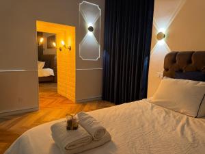 Appartements Evasio Suite : photos des chambres