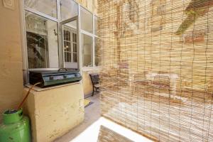 Traditional Maltese Townhouse with Backyard Garden and Seafront Location