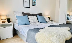 Nordlicht, Olpenitz - moderne Ferienwohnung in direkter Strandnähe mit eigenem Eingang, Sauna, Kaminofen, Terrasse und Parkplatz