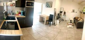 Appartements coeur de village : photos des chambres