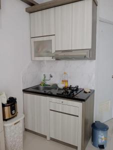 Green pramuka by Panda Room