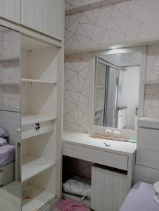 Green pramuka by Panda Room