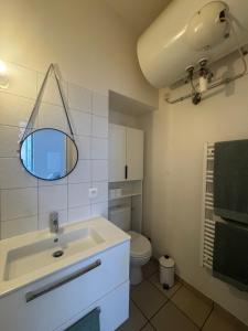 Appartements Appartement lumineux et cosy au coeur de la ville : photos des chambres