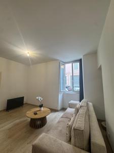 Appartements Appartement lumineux et cosy au coeur de la ville : photos des chambres