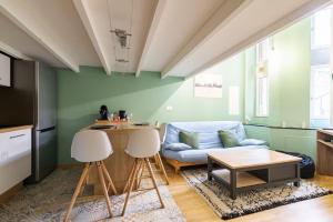 Appartements Duplex proche de la cite de la gastronomie : photos des chambres