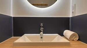 Appartements L Evasion Cosy Central Cosy : photos des chambres