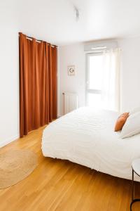 Appartements Lumineux 2 chambres avec terrasse et parking prive : photos des chambres
