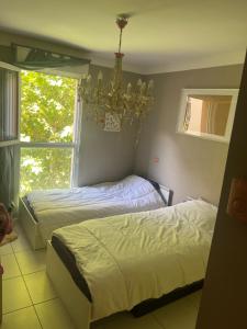 Duplex 120m ,50m terrasse proche centre et mer