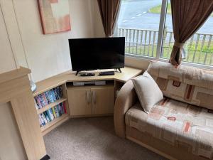 Clarach Bay Escape 3 Bedroom PetFriendly Caravan with Decking Sleeps 6