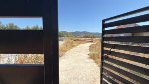 Private Parking for Cars, Vans, Campers, Bus, RV, Trailer & Caravan with Easy Access to Expressway & Main Road - Quiet Location with Mountain Views, Near the Beach, with 2 Lose Guard Dogs, No Water or Electric, No Shower or Toilet - Self Check-in