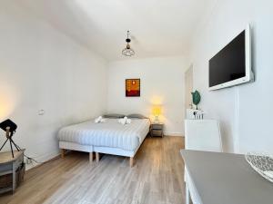 Appartements Lumineux et Cozy - Coeur de Cannes : photos des chambres