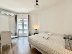 Appartements Lumineux et Cozy - Coeur de Cannes : photos des chambres