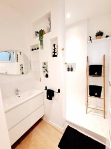 Appartements Au Detour des Sacres -Hypercentre-Boulingrin : photos des chambres