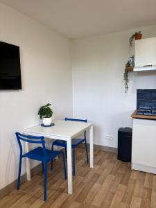 Appartements Charmant studio : photos des chambres
