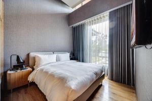 Boutech Wuri Village Hotel