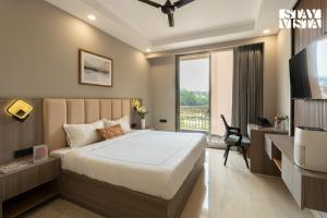 StayVista Residences near Cyber City Hub with Gym & Air Purifier