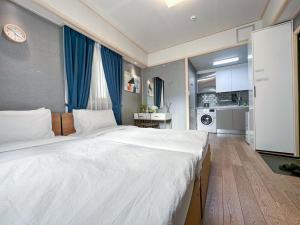 Red Stone Stay - Apartahoteles, Seúl
