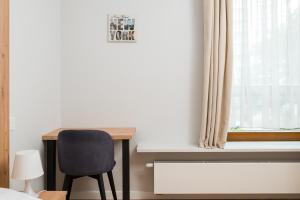 Solidarności Skyline Apartment by BookingHost