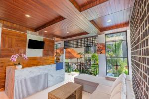 Tridharma Suites