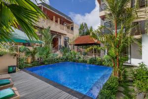 Tridharma Suites