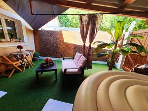 Appartements Studio19 Cosy Sauna Jacuzzi et jardinet privatifs : photos des chambres