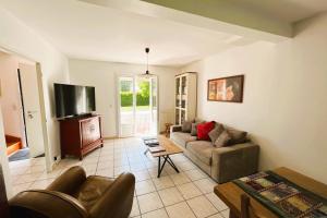 Maisons de vacances Spacious house of 100 m with a beautiful garden : photos des chambres