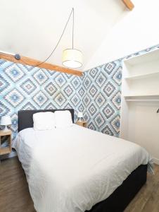 Appartements Bel Appartement T1Bis en centre ville de Cholet : photos des chambres