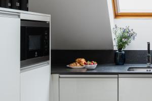 Coco Chanel Boutique Apartment by Goodnite cz