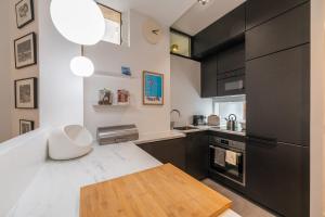 Appartements Appartement Duhesme - Welkeys : photos des chambres