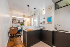 Appartements Appartement Duhesme - Welkeys : photos des chambres