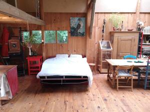 Chalets Grange atypique en pleine nature : photos des chambres