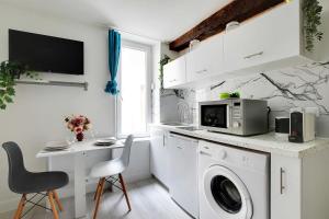 Appartements Cozy Studio in the heart of the Marais : photos des chambres