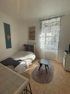 Appartements Studio meuble centre-ville Saint Junien : photos des chambres