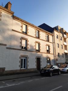 Appartements Le charme de l-ancien au gout du jour avec parking : photos des chambres