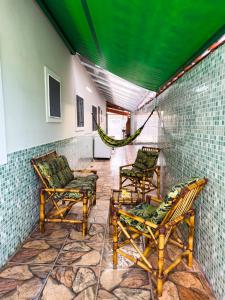 Casa Mongagua Piscina com luz de LED, cascata, churrasqueira jardim vertical