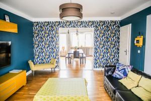 Appartements Grand Logement Cosy Residence des Romains : photos des chambres
