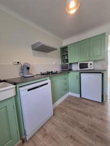 Maisons de vacances Petite maison a Bagnoles de l-Orne avec jardin : photos des chambres