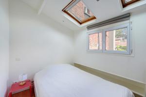 Appartements Loft lumineux proche transports & Paris : photos des chambres