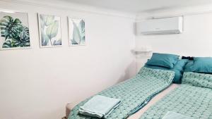 2 separate bedrooms and living room fully equipped with AC
