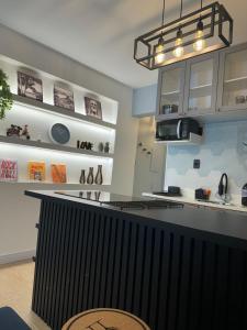 Studio com sauna, piscina e academia próximo às praias oceânicas