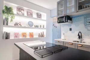 Studio com sauna, piscina e academia próximo às praias oceânicas