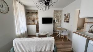 Appartements Le Refuge Urbain : photos des chambres