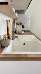 Appartements Le Refuge Urbain : photos des chambres