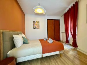 Appartements Suite Madeleine - Coeur Historique : photos des chambres