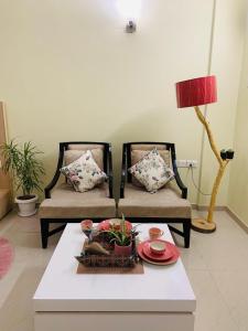 Anandam- Place of Happiness- Balcony & Garden View