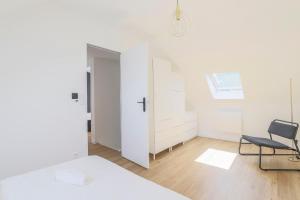 Maisons de vacances L-Orangerie, Maison moderne avec jardin : photos des chambres
