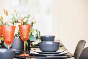 Maisons de vacances L-Orangerie, Maison moderne avec jardin : photos des chambres